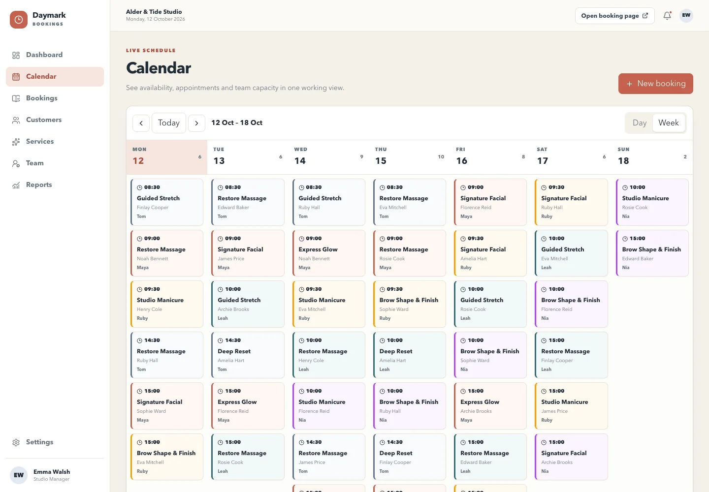Daymark Bookings weekly calendar showing scheduled appointments across services and team members